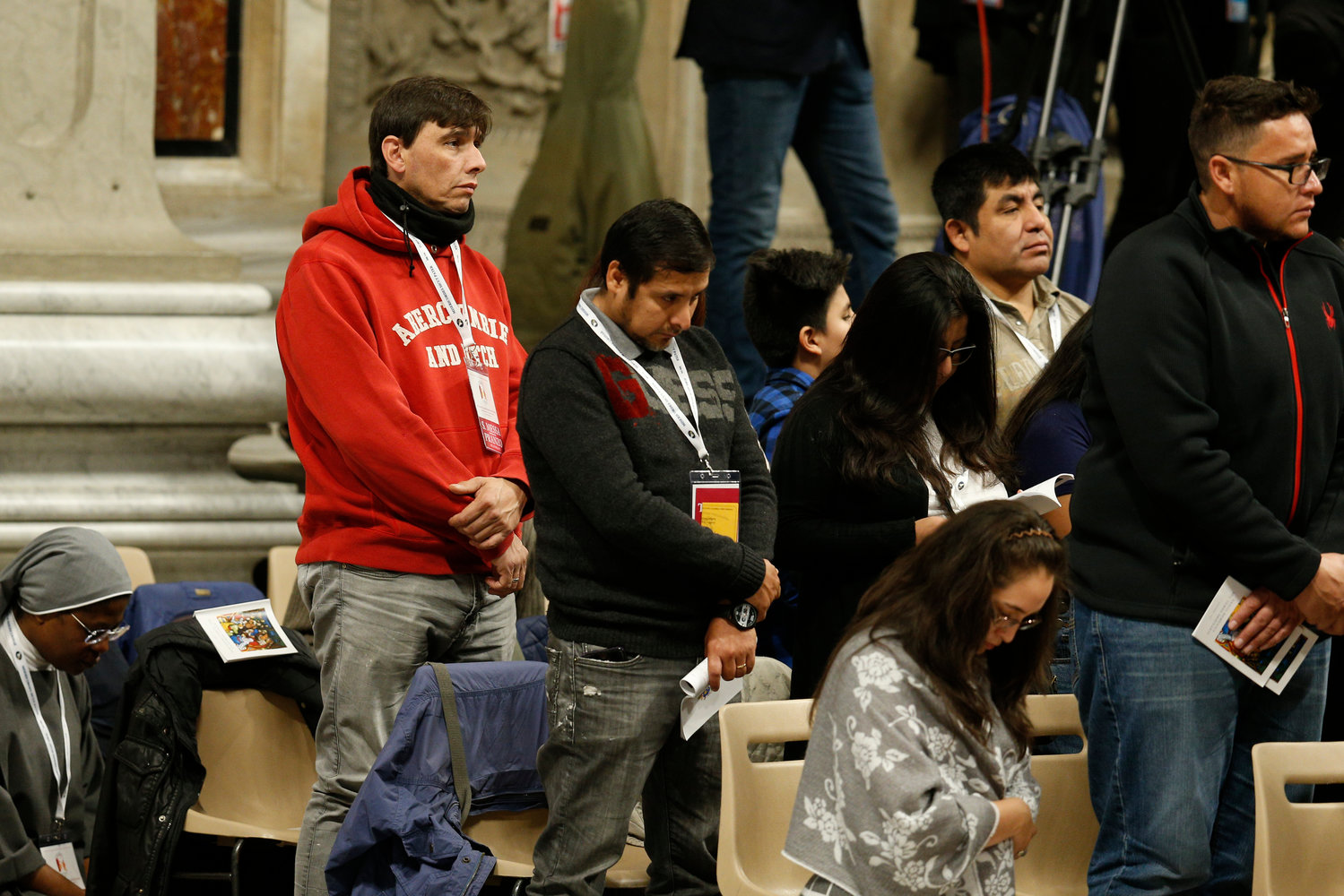 People attend Mass celebrated by Pope Francis to mark World Day of the Poor in St. Peter’s Basilica at the Vatican Nov. 17, 2019. After the Mass the Pope at lunch with hundreds of poor people. (CNS photo/Paul Haring) See POPE-POOR Nov. 17, 2019.in St. Peter’s Basilica at the Vatican Nov. 17, 2019. After the Mass the Pope at lunch with hundreds of poor people.